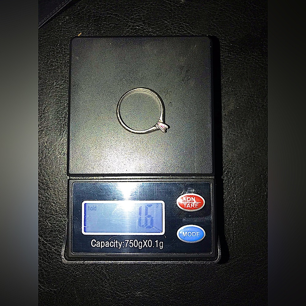 White gold ring 1.6 grams and 1/4 carat princess cut diamond. Tested/appraised!!